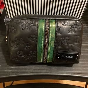 L.A.M.B. cosmetic clutch in Carbon